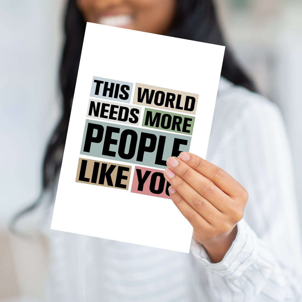 A person holding the appreciation card to demonstrate the professional weight and large scale of the product.