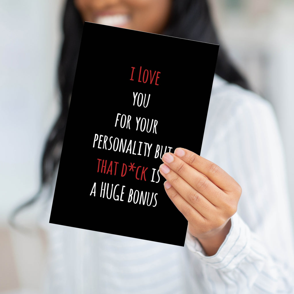 A person holding the "Huge Bonus" card to demonstrate the professional weight and large scale of the product.